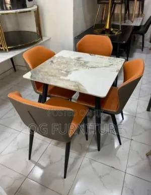 An Orange 4 Seater Marble Dinning Table You Can Afford.