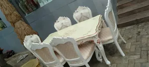 A Unique Royal Dinning Table With Beautiful Chairs.