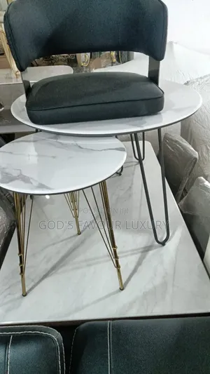 Marble Center Table and Side Stool.
