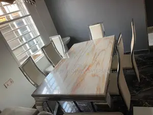 Luxury 6-Seater Marble-Top Dining Set With Chrome Chairs