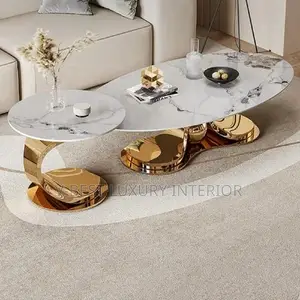 Oval Marble Center Table Features a Distinctively Sculpted Gold