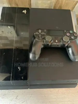 Neatly Used Ps4 With 5 Games on It