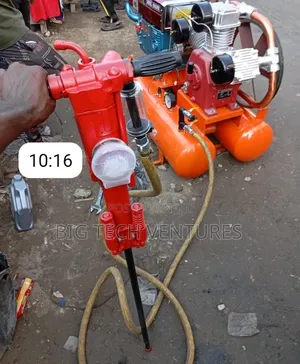 Jackhammer Powered By An Air Compressor.It Is Designed For Breaking