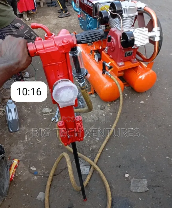 Jackhammer Powered By An Air Compressor.It Is Designed For Breaking