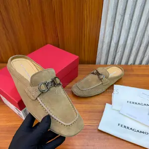 Luxury Update Salvatore Ferragamo Gancini Ornament Mule.