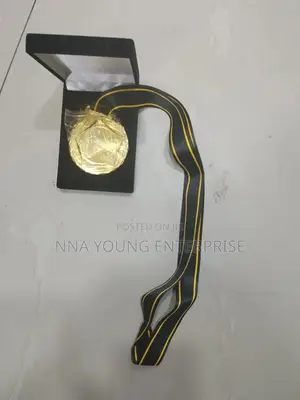 Gold-colored Metal Medal