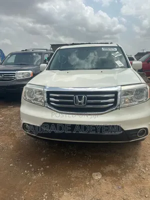 Honda Pilot Touring w/RES/Navi 4WD (3.5L 6cyl 5A) 2013 White