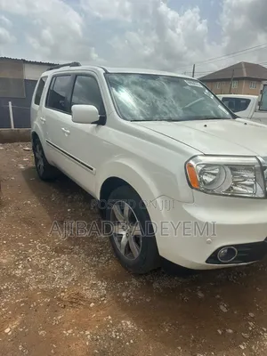 Honda Pilot Touring w/RES/Navi 4WD (3.5L 6cyl 5A) 2013 White