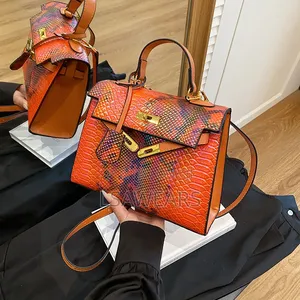 European and American Vintage Snake Shoulder Crossbody Handbag Orange