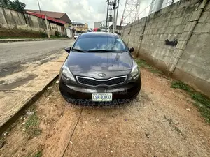 Kia Rio EX 4dr Sedan (1.6L 4cyl 6A) 2012 Brown
