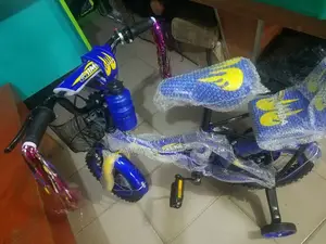 Good Size 12 Children Riding Bike
