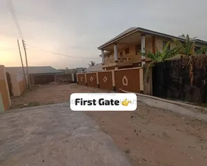A Well Fenced and Gated Two Plots of Land