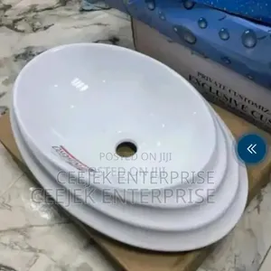 White Cantertop Basin With Design