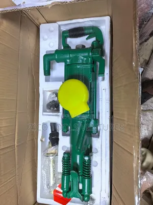 Air Leg Pneumatic Rock Drill or Jackhammer.