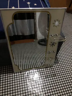 Wall Glass Mirror and Flower Vase