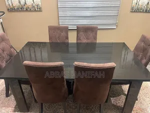 Elegant Dining Table Set With 6 Chairs and Matching Storage Cabinet
