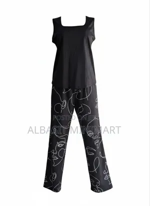 Ladies 2-Piece Sleeveless Top Paired With Straight-Leg Trousers.