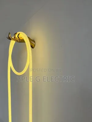Hand With Tube Wall Lamp