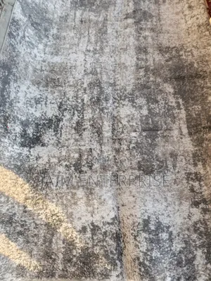 Contemporary 5 by 7 Albanian Center Rug