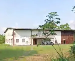 Company Yard Sitting on 7424sqm Land Along Ogunu Road Warri