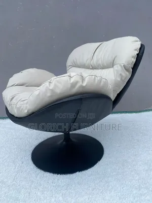 Egg Swivel Lounge Chair – Cream Tufted Leather With Black Tulip Base