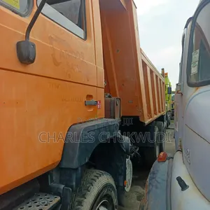 Man Diesel Tipper With Auxiliary and Miller Bucket