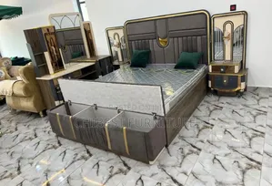 Imported 6by7 Bed With Dresser, Cupboards and Footrest.