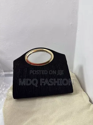 Pleated Black Shimmer Evening Clutch With Gold Oval Handle
