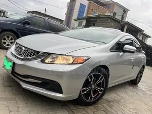 Honda Civic EX-L 4dr Sedan w/Nav (1.8L 4cyl CVT) 2014 Silver