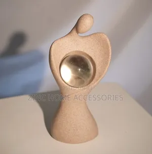 Figurine With Glass Ball