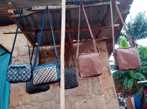 I Sells Clothes for Both Ladies and Guys and Also Bags