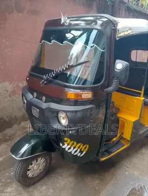 Bajaj RE 2022 Yellow