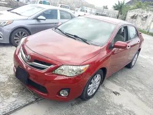 Toyota Corolla Base 4dr Sedan (1.8L 4cyl 5M) 2011 Red