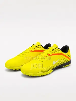 Warrior Neon Yellow and Orange Turf Soccer Shoes