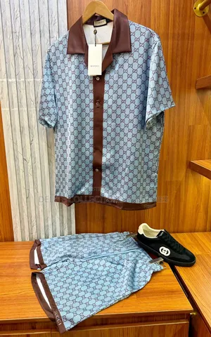 Luxury Update  
Gucci Printed Silk Twill Shirt Short.
