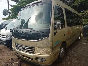 Toyota Coaster 2018 Gold