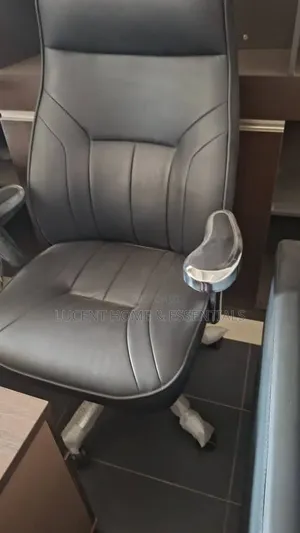 Luxury Black Leather Ceo Chair With Polished Chrome Armrests