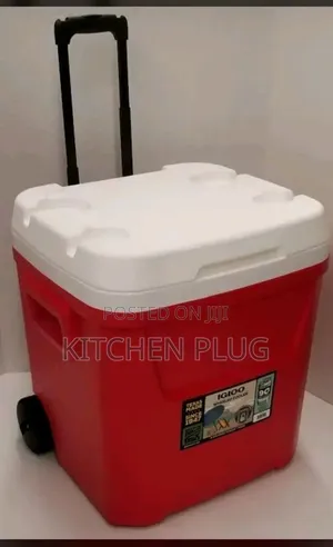 Igloo Ice Cube Roller Cooler in Red, 60-Quart Capacity.
