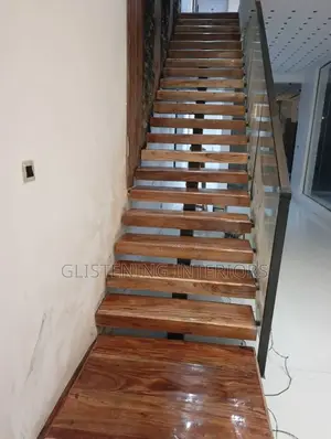 Mahogany Floating Stairs With a 10mm Tempered Plain Glass