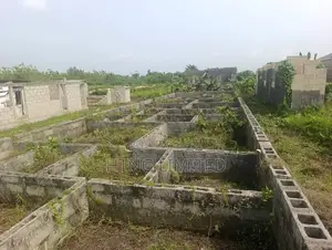 Half Plot of Land for Sale With Foundation on It