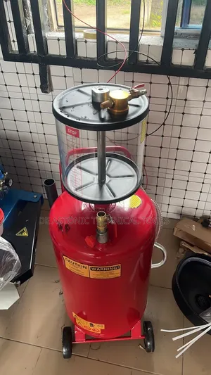 Pneumatic Oil Extractor With A Plate Cover