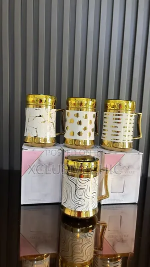 Design Mirror White and Gold Cup