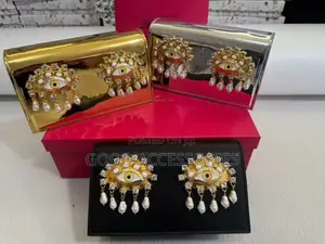 Schiaparelli Eyes Alligator Clutch