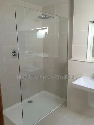 Luxury Frameless Fixed Shower Cubicle With Ultra-Clear Tempered Glass.