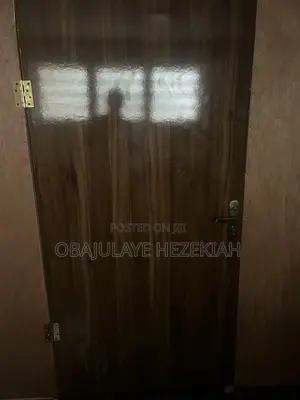 Neat Wooden Door With Lock Handle