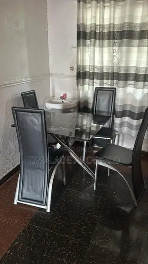 4 Setter Glass Top Dinning Set