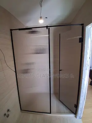 8mm Flutted Shower Cubicle Glass Installation.