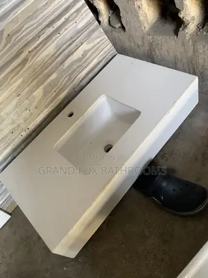 Wall-Mounted Surface Vanity Sink With Integrated Rectangular Basin