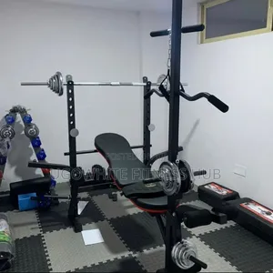 Multi-Function Weight Bench Set With a Black Frame and Red Accents