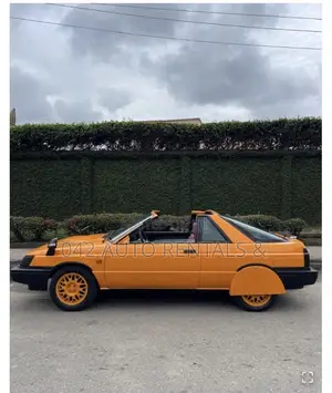 Vintage Nissan Yellow for Hire